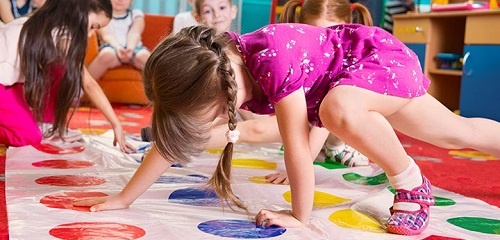 Students use Twister game to extend active play – LucieLink